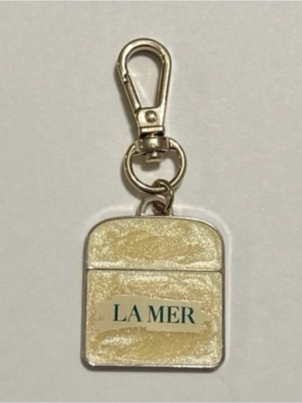 La Mer Cream and Gold Clip-On Keyring Charm
